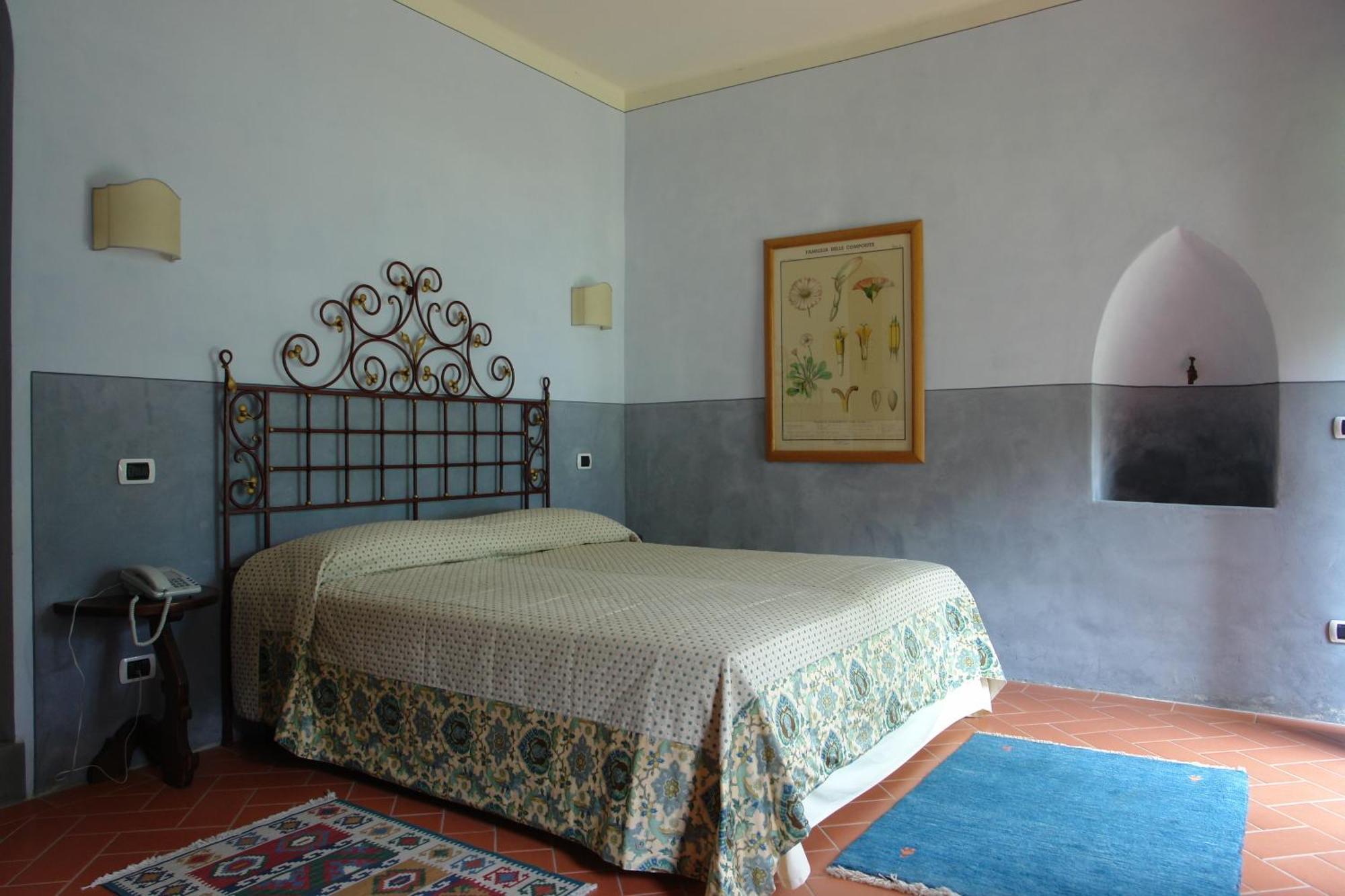 Relais Villa Belpoggio - Residenza D'Epoca Loro Ciuffenna Δωμάτιο φωτογραφία